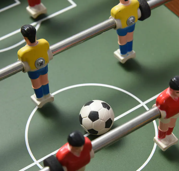 Quomodo Foosball Ludi Improve Workplace Team Building and Productivity?